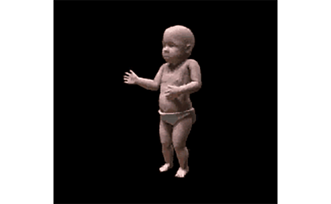 立って踊っている赤ちゃん